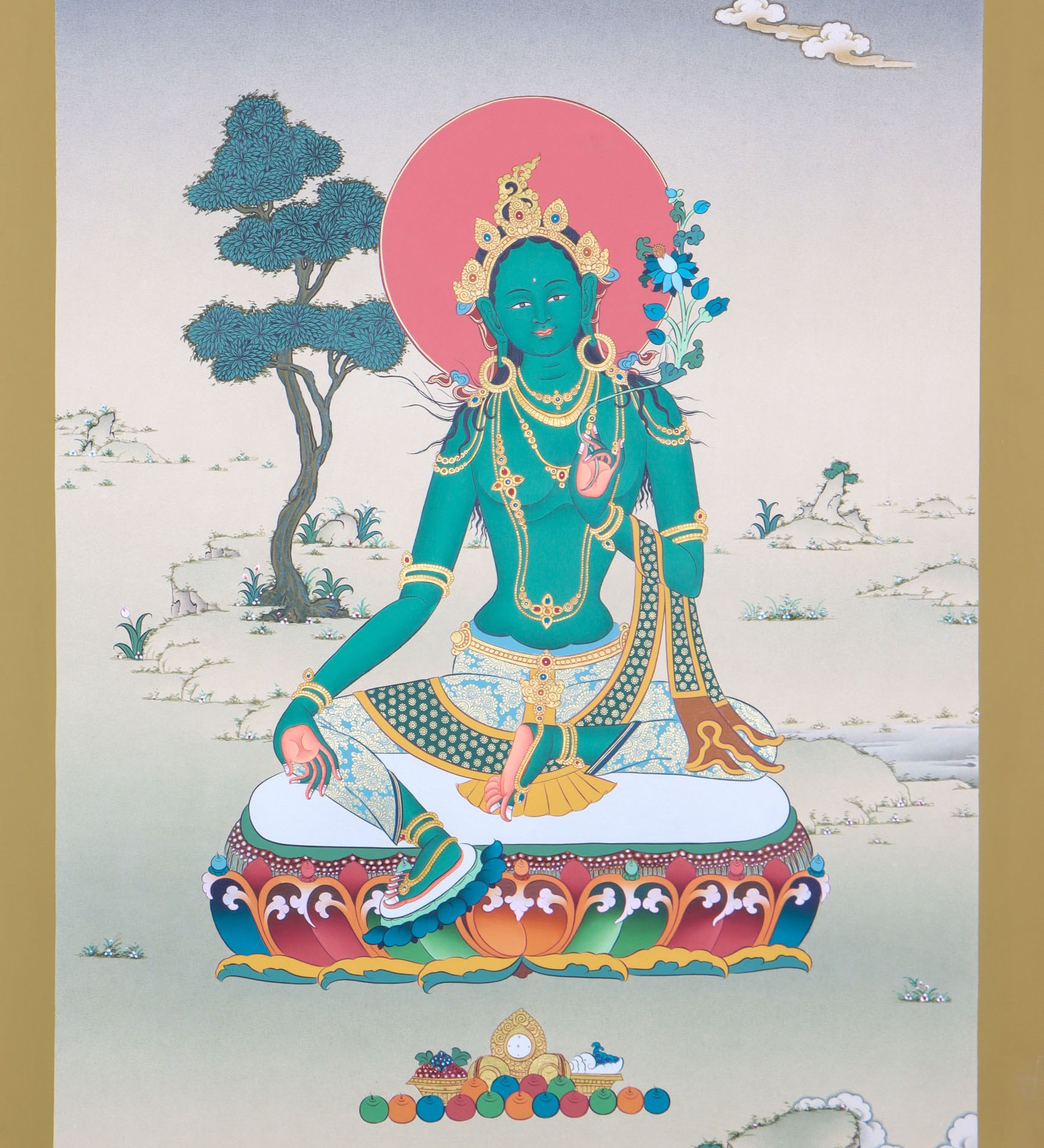Green Tara thangka is a holy depiction of the famed Buddhist goddess.