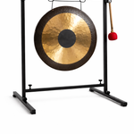 Hand made Gong on a stand with a red mallet on a white background