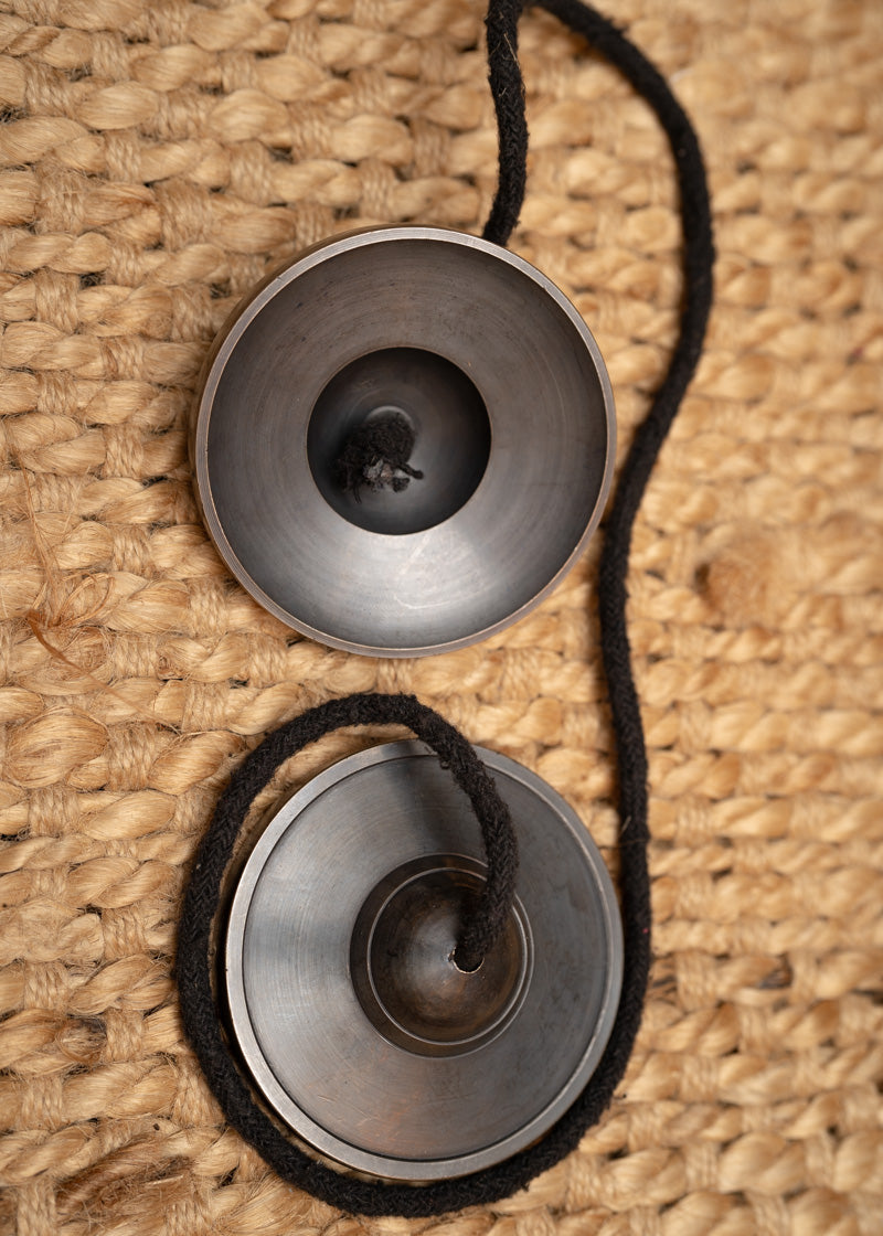 Plain Tingsha for spiritual and healing practices.