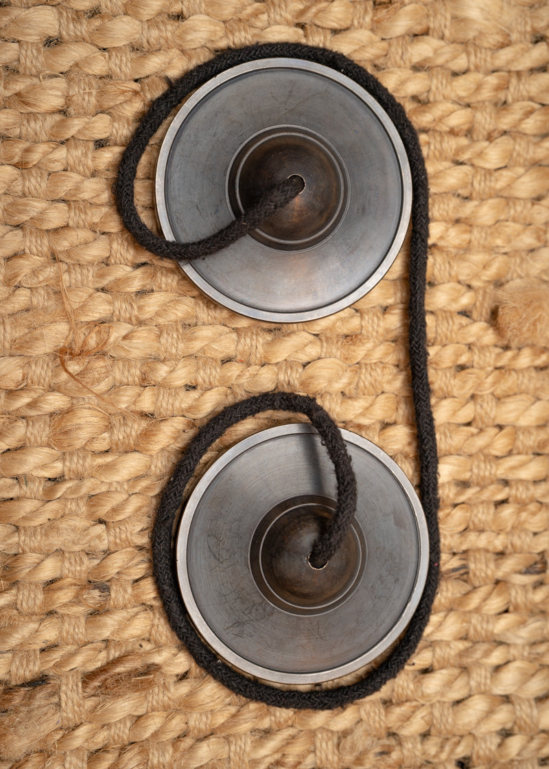 Plain Tingsha for spiritual and healing practices.