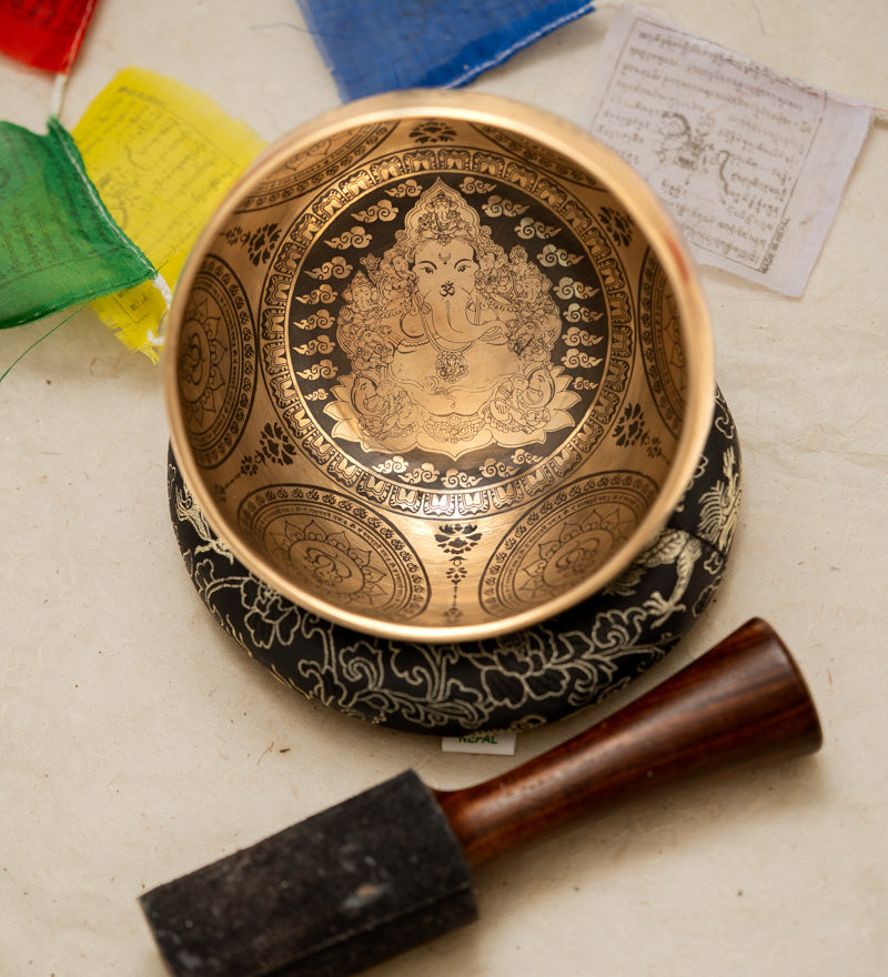Handcrafted Tibetan Singing Bowl with Lord Ganesh Carved.