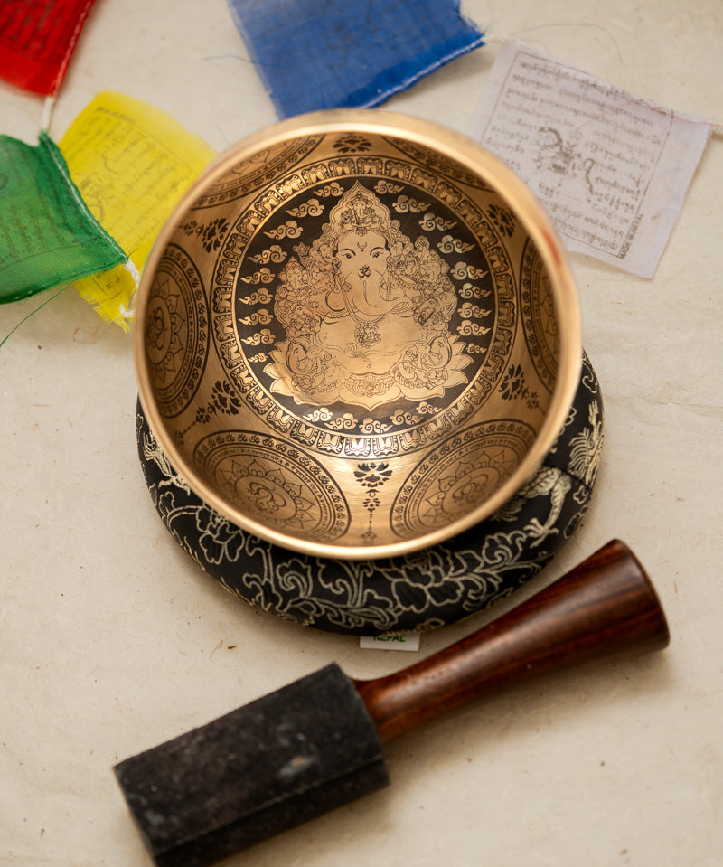 Handcrafted Tibetan Singing Bowl with Lord Ganesh Carved.