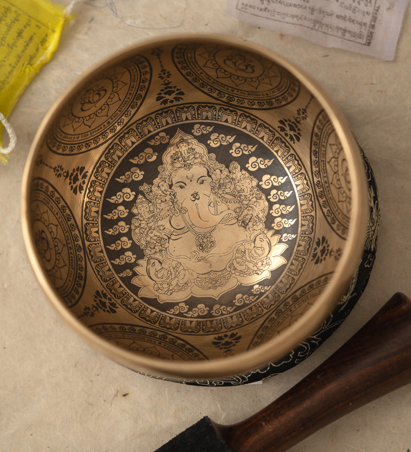 Handcrafted Tibetan Singing Bowl with Lord Ganesh Carved.