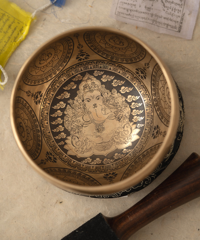 Handcrafted Tibetan Singing Bowl with Lord Ganesh Carved.