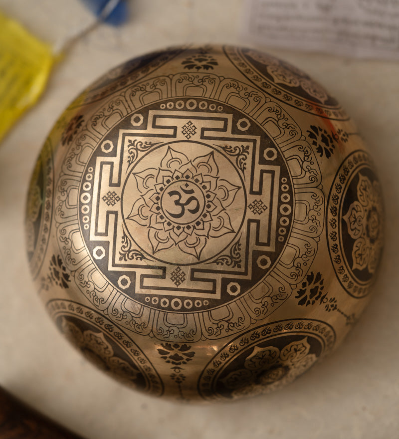 Handcrafted Tibetan Singing Bowl with Lord Ganesh Carved.