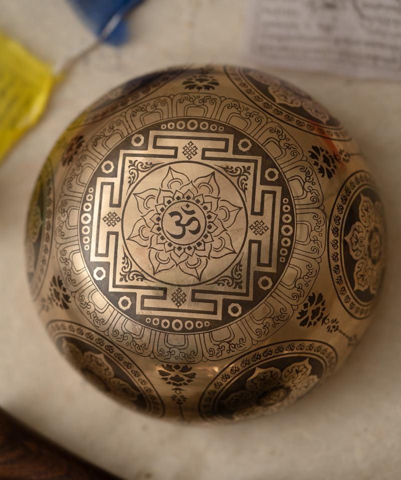 Handcrafted Tibetan Singing Bowl with Lord Ganesh Carved.