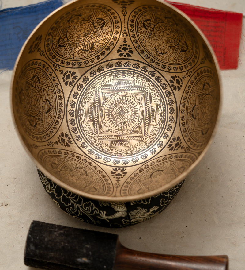 Mandala Carved Singing Bowl for sound healing.