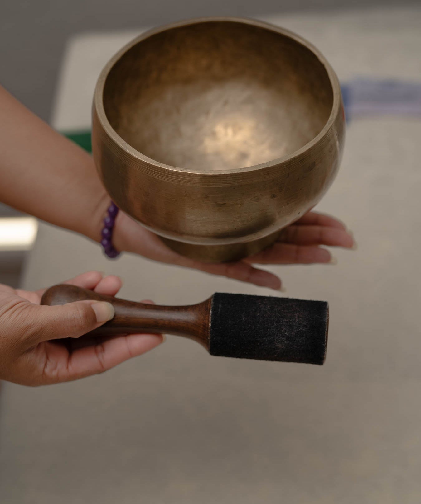 Antique Naga singing bowl with pedestal base tuned to D4 and E4 for chakra healing and meditation