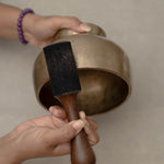 Antique Naga singing bowl with pedestal base tuned to D4 and E4 for chakra healing and meditation