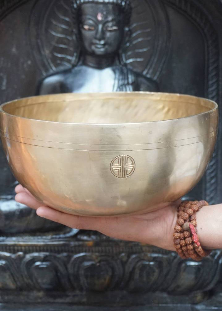 Tibetan Handcrafted Lotus Engraved Singing Bowl for meditation.