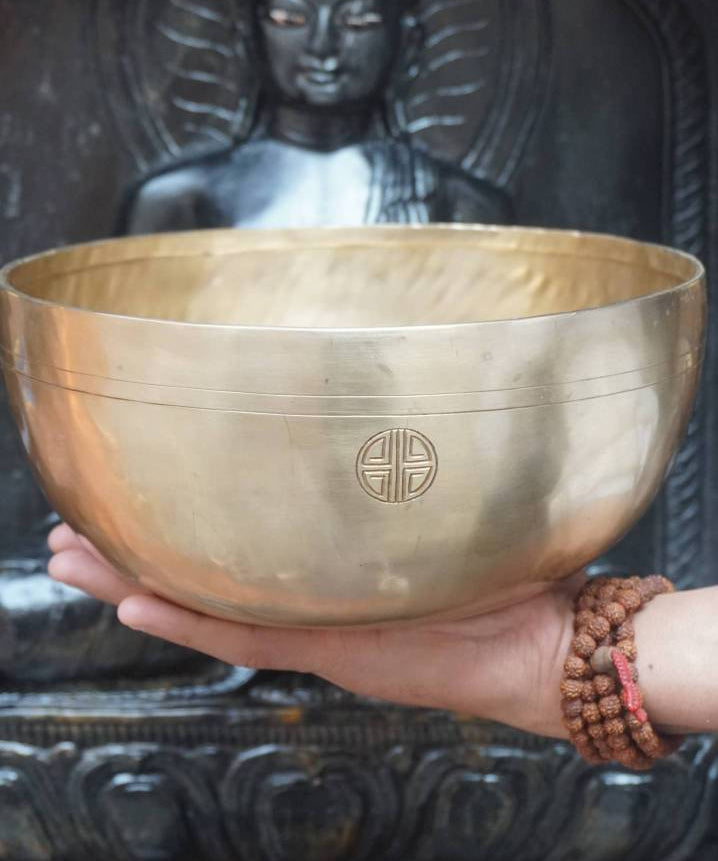 Tibetan Handcrafted Lotus Engraved Singing Bowl for meditation.