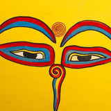 Hand-painted sacred eyes spiral symbols on the forehead and nose, representing wisdom and spiritual awareness.