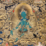 green tara thangka with lotus throne and gold detailing