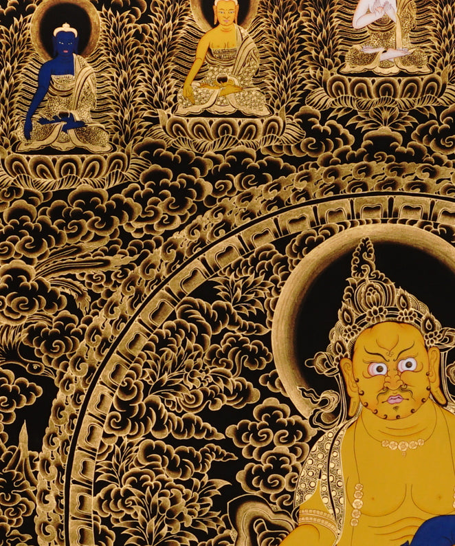 Yellow Zambhala Thangka painting with golden detailing, surrounding Buddhas, and traditional Tibetan Buddhist prosperity symbolism.