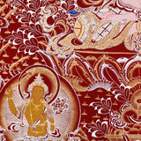 Chenrezig Thangka painting with red background, Avalokiteshvara seated on lotus throne, and traditional Tibetan Buddhist compassion symbolism.