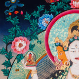 Namgyalma Thangka Painting showing the Tibetan Buddhist long life deity Ushnishavijaya with three faces, multiple arms, sacred implements, lotus throne, radiant halo, floral background and offering details.