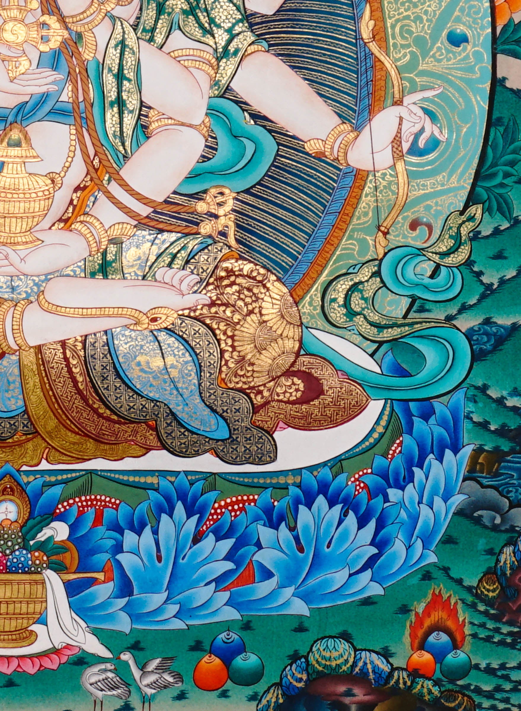 Namgyalma Thangka Painting showing the Tibetan Buddhist long life deity Ushnishavijaya with three faces, multiple arms, sacred implements, lotus throne, radiant halo, floral background and offering details.