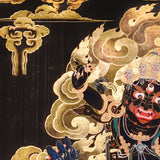 Vajra Guru Thangka Painting showing a wrathful Tibetan Buddhist protector deity riding a fierce blue mount, surrounded by flame aura, golden clouds, skull crown, sacred ornaments, lotus base and offering details.