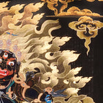 Vajra Guru Thangka Painting showing a wrathful Tibetan Buddhist protector deity riding a fierce blue mount, surrounded by flame aura, golden clouds, skull crown, sacred ornaments, lotus base and offering details.
