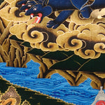 Vajra Guru Thangka Painting showing a wrathful Tibetan Buddhist protector deity riding a fierce blue mount, surrounded by flame aura, golden clouds, skull crown, sacred ornaments, lotus base and offering details.