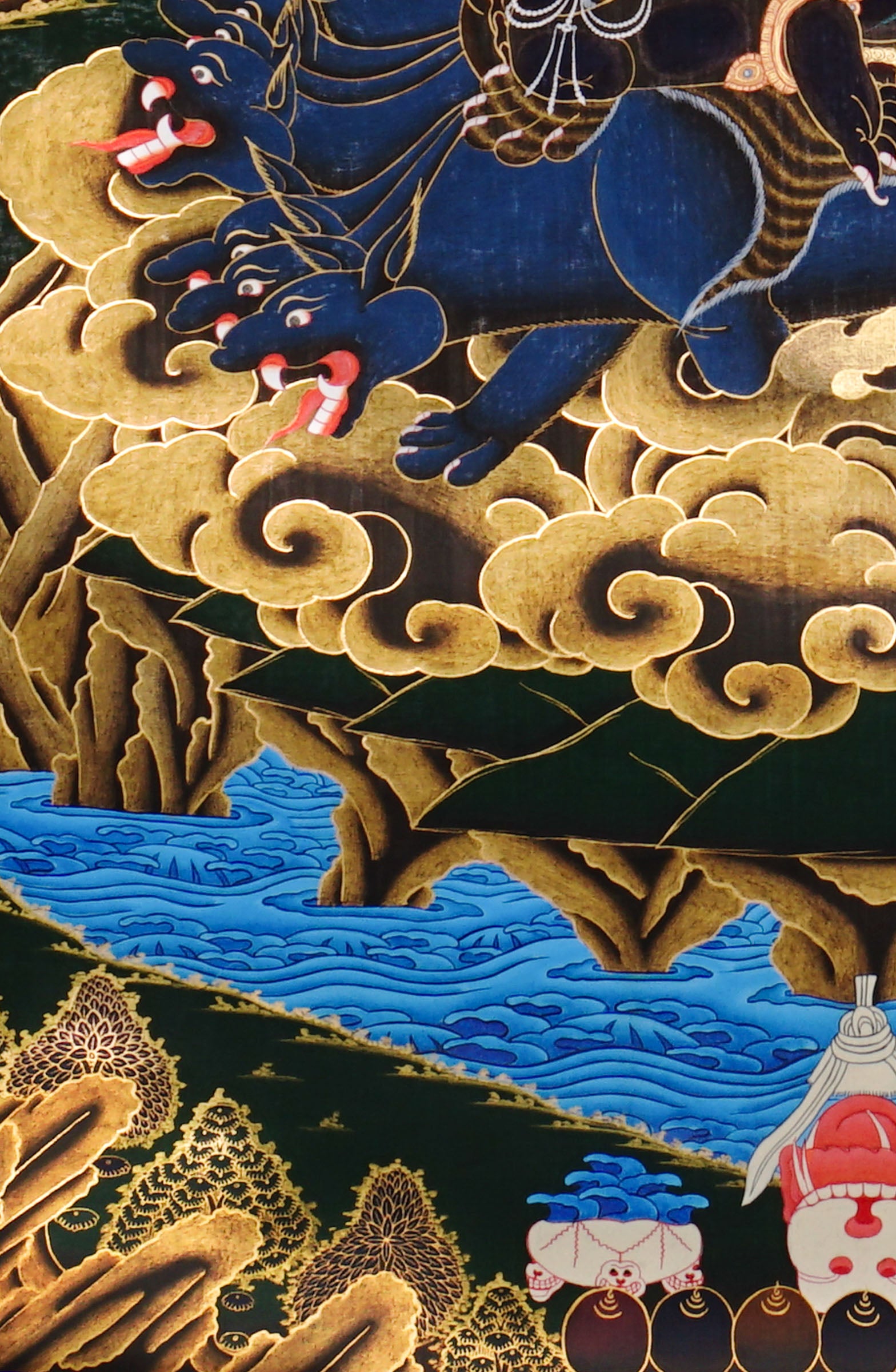 Vajra Guru Thangka Painting showing a wrathful Tibetan Buddhist protector deity riding a fierce blue mount, surrounded by flame aura, golden clouds, skull crown, sacred ornaments, lotus base and offering details.