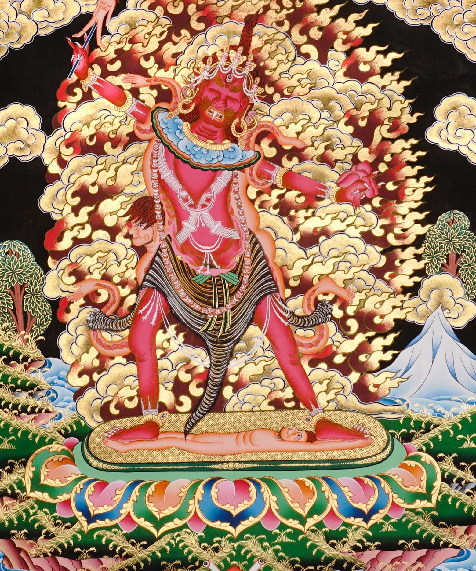 Ekajati Thangka Painting showing a wrathful red Tibetan Buddhist protector goddess with flame aura, sacred implements, skull ornaments, subdued figure, lotus base, offering details and Himalayan landscape background.