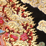 Ekajati Thangka Painting showing a wrathful red Tibetan Buddhist protector goddess with flame aura, sacred implements, skull ornaments, subdued figure, lotus base, offering details and Himalayan landscape background.