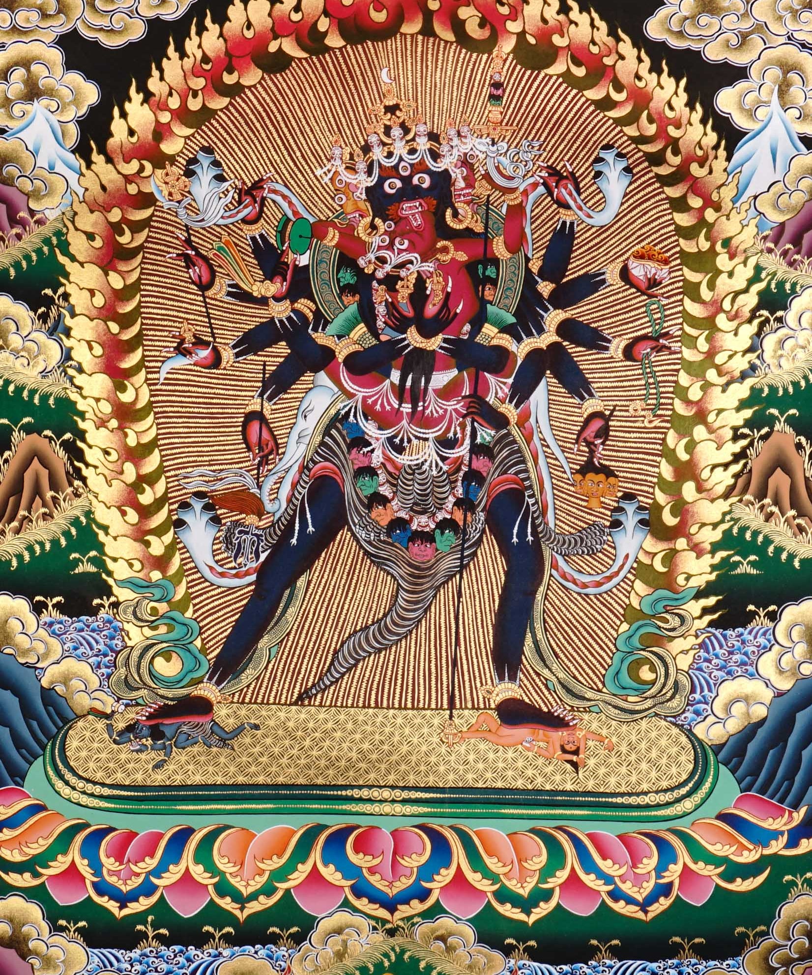 Chakrasambhara Thangka Painting showing in a wrathful form with multiple arms, flame aura, skull ornaments, sacred implements, lotus base and Himalayan landscape details.