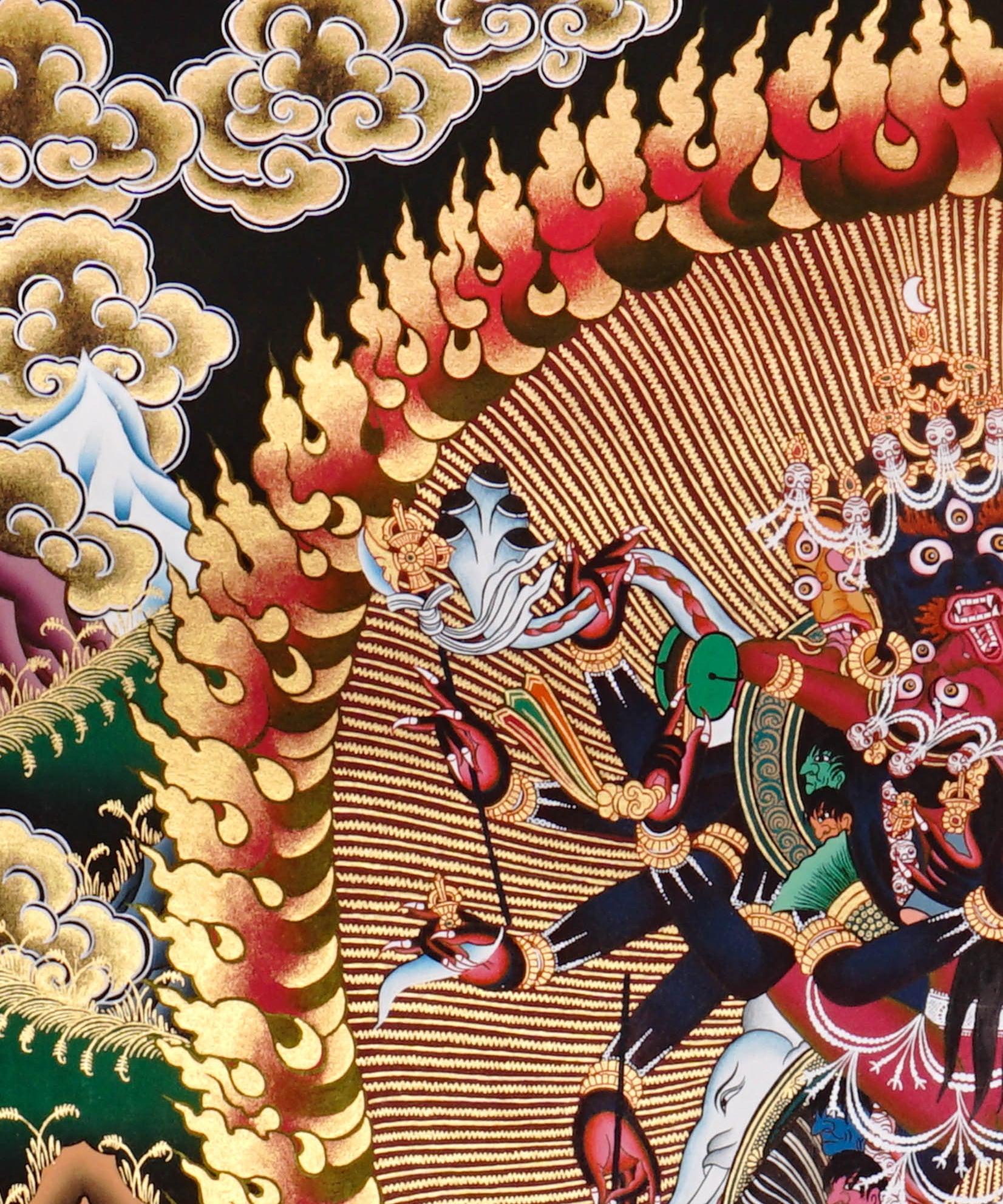 Chakrasambhara Thangka Painting showing in a wrathful form with multiple arms, flame aura, skull ornaments, sacred implements, lotus base and Himalayan landscape details.