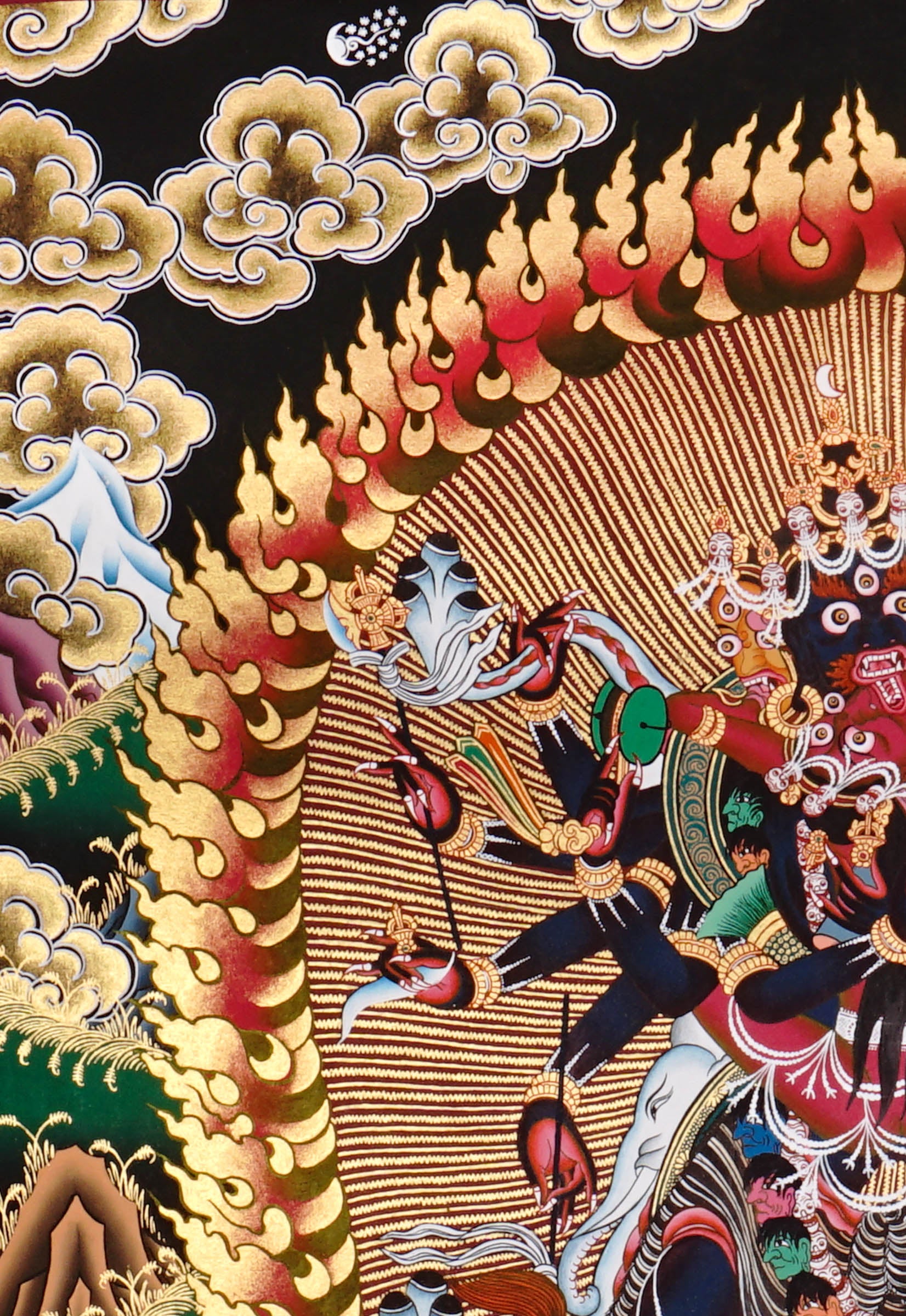 Chakrasambhara Thangka Painting showing in a wrathful form with multiple arms, flame aura, skull ornaments, sacred implements, lotus base and Himalayan landscape details.