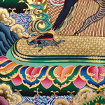 Chakrasambhara Thangka Painting showing in a wrathful form with multiple arms, flame aura, skull ornaments, sacred implements, lotus base and Himalayan landscape details.