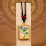 Lotus ghau pendant close up hand painted Himalayan spiritual art
