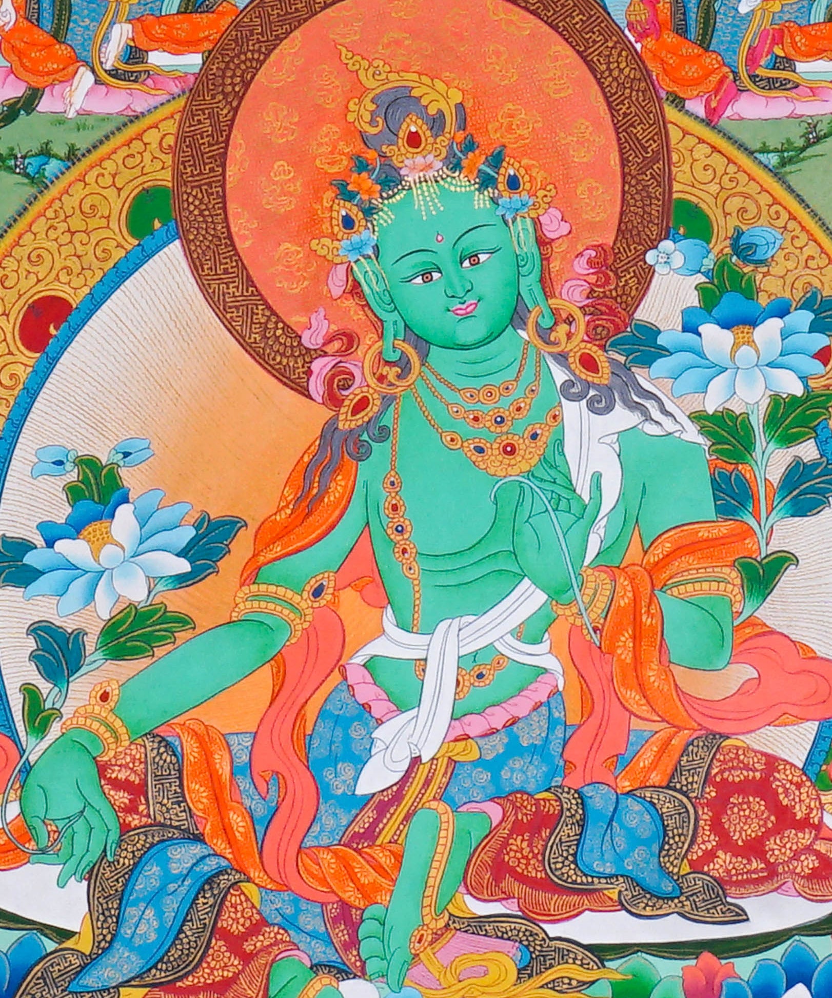 21 Tara Thangka Painting showing Green Tara seated at the centre with blue lotus flowers, surrounded by the Twenty-One Taras in different colours, lotus thrones, radiant halos, clouds, water and Himalayan landscape details.