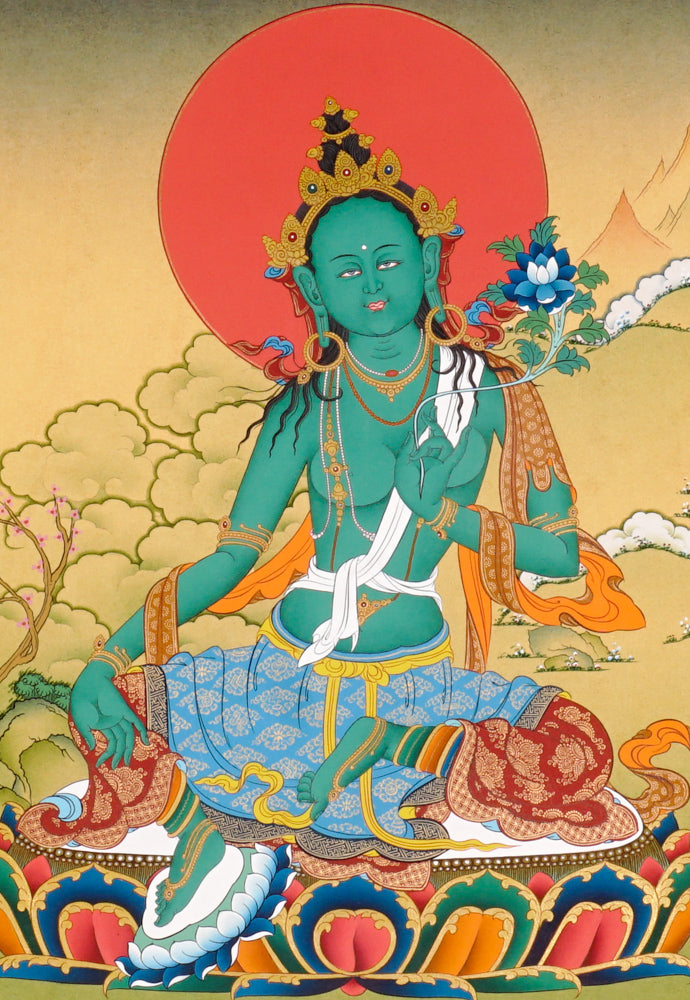 Green Tara Thangka painting with lotus throne, blue utpala flower, serene landscape, and Tibetan Buddhist compassion symbolism.