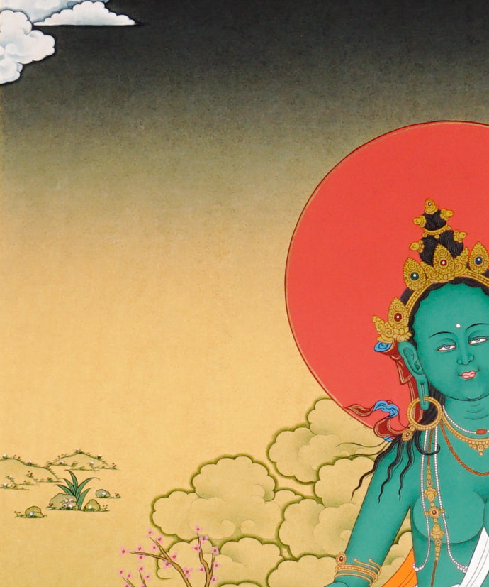 Green Tara Thangka painting with lotus throne, blue utpala flower, serene landscape, and Tibetan Buddhist compassion symbolism.
