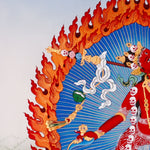 Vajrayogini Thangka painting with flame halo, lotus base, skull garland, and Tibetan Buddhist tantric symbolism.