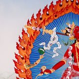 Vajrayogini Thangka painting with flame halo, lotus base, skull garland, and Tibetan Buddhist tantric symbolism.