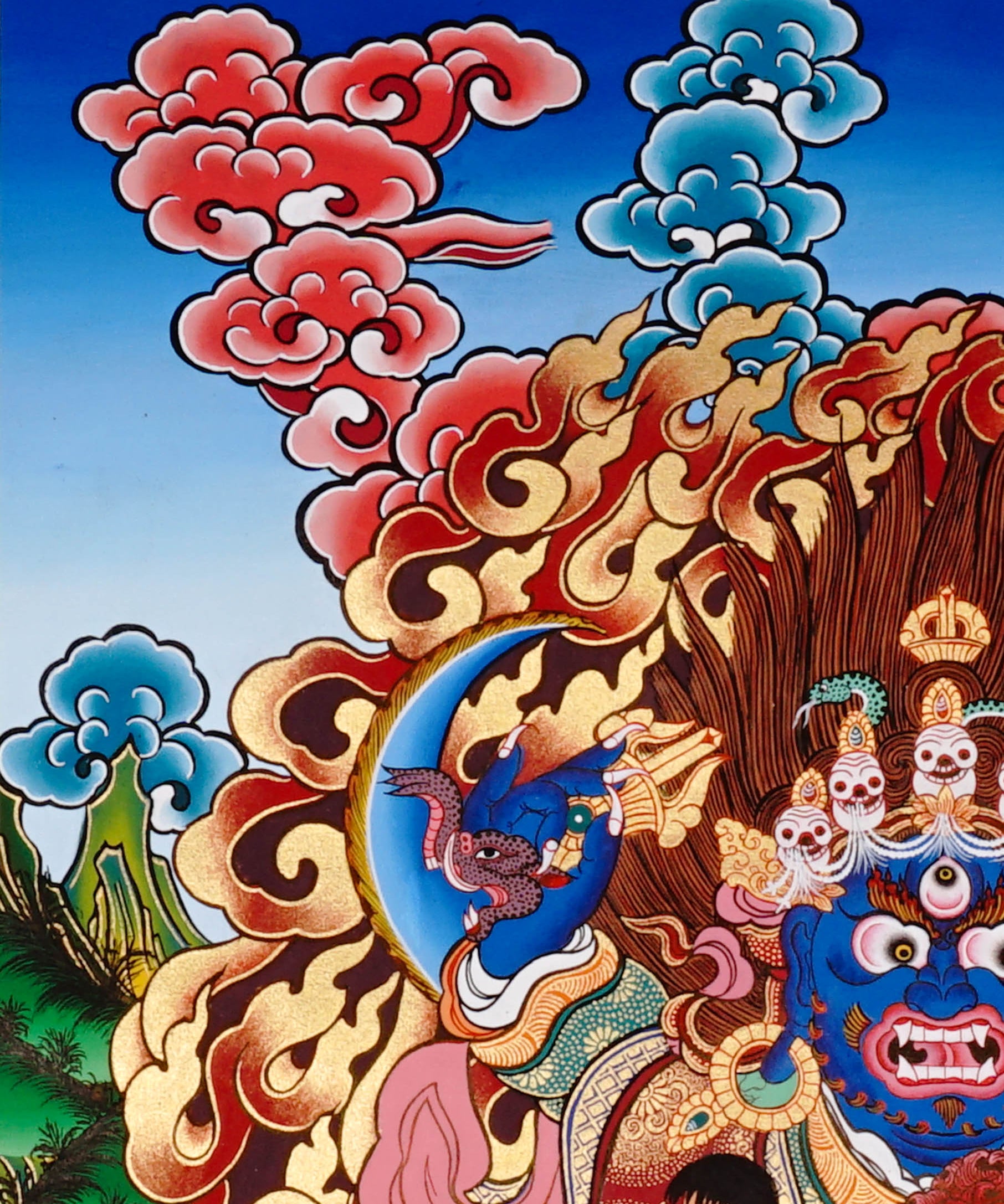 Mahakala Thangka painting with flame halo, lotus base, skull ornaments, and Tibetan Buddhist protector symbolism.