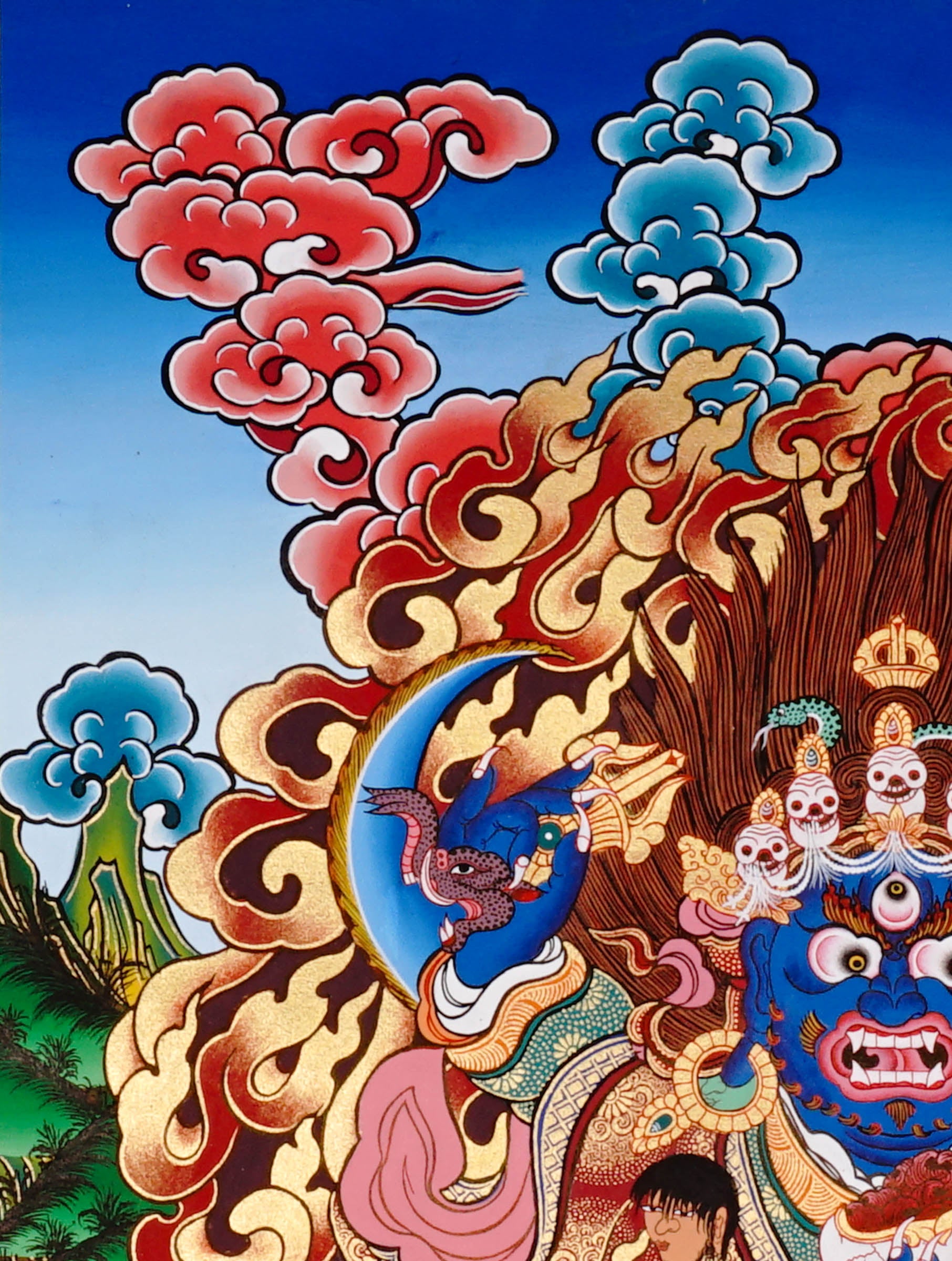 Mahakala Thangka painting with flame halo, lotus base, skull ornaments, and Tibetan Buddhist protector symbolism.