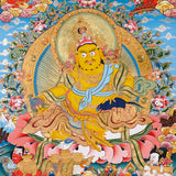 Yellow Zambhala thangka with Tibetan Buddhist wealth deity seated on lotus seat