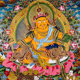 Yellow Zambhala thangka with Tibetan Buddhist wealth deity seated on lotus throne