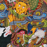 Singha Zambhala thangka with deity riding snow lion on blue background