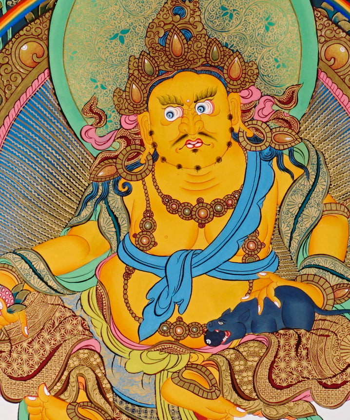 Yellow Zambhala thangka with prosperity deity seated on lotus throne