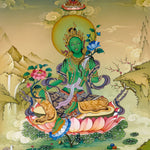 Green Tara thangka painting Tibetan goddess seated on lotus holding blue lotus in detailed Himalayan landscape