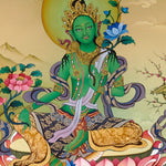 Green Tara thangka painting Tibetan goddess seated on lotus holding blue lotus in detailed Himalayan landscape