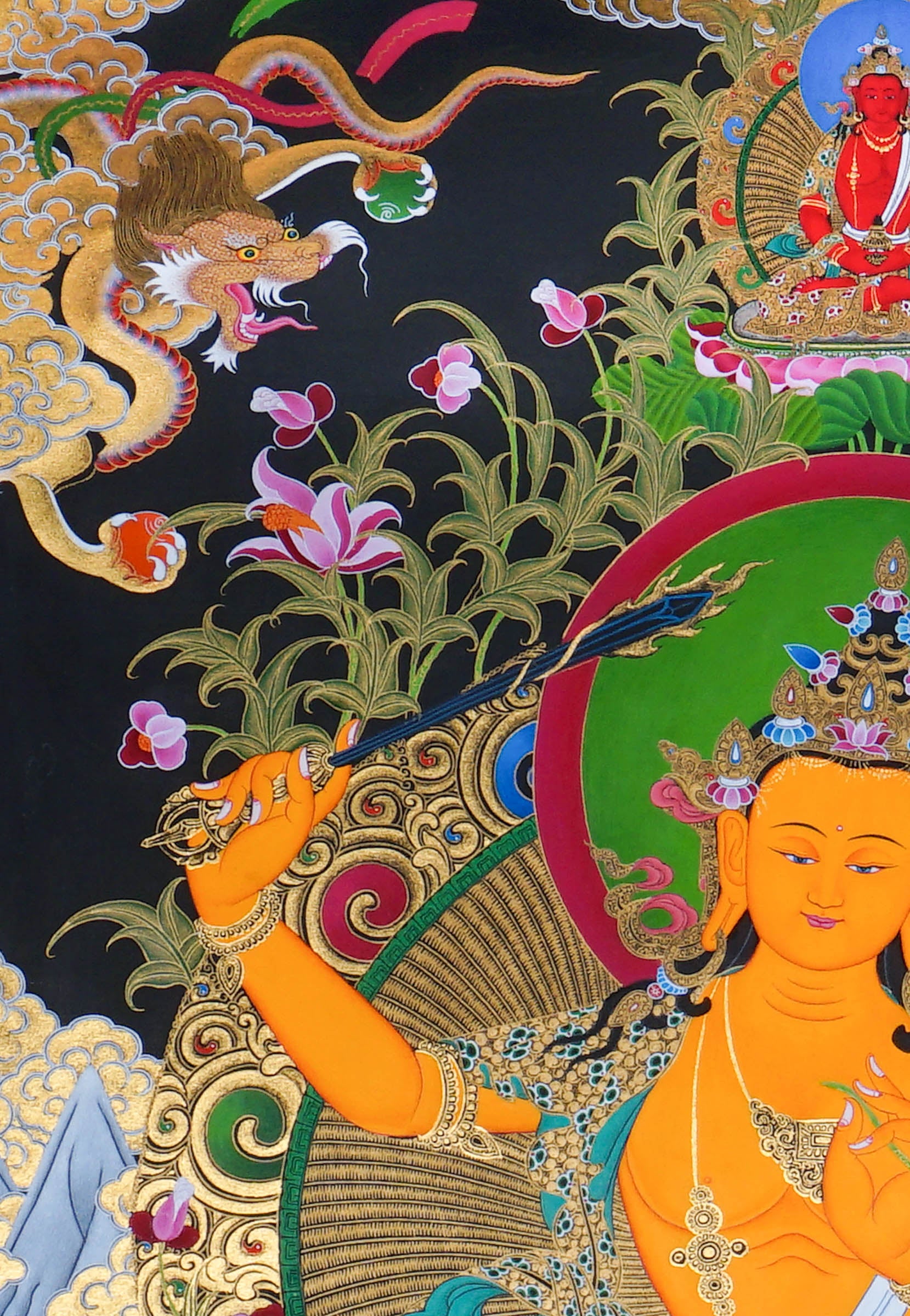 Manjushree Thangka Painting seated on a lotus throne with a raised wisdom sword, scripture on lotus, sacred ornaments, offering symbols, flowers, clouds, mountains and Himalayan landscape details.