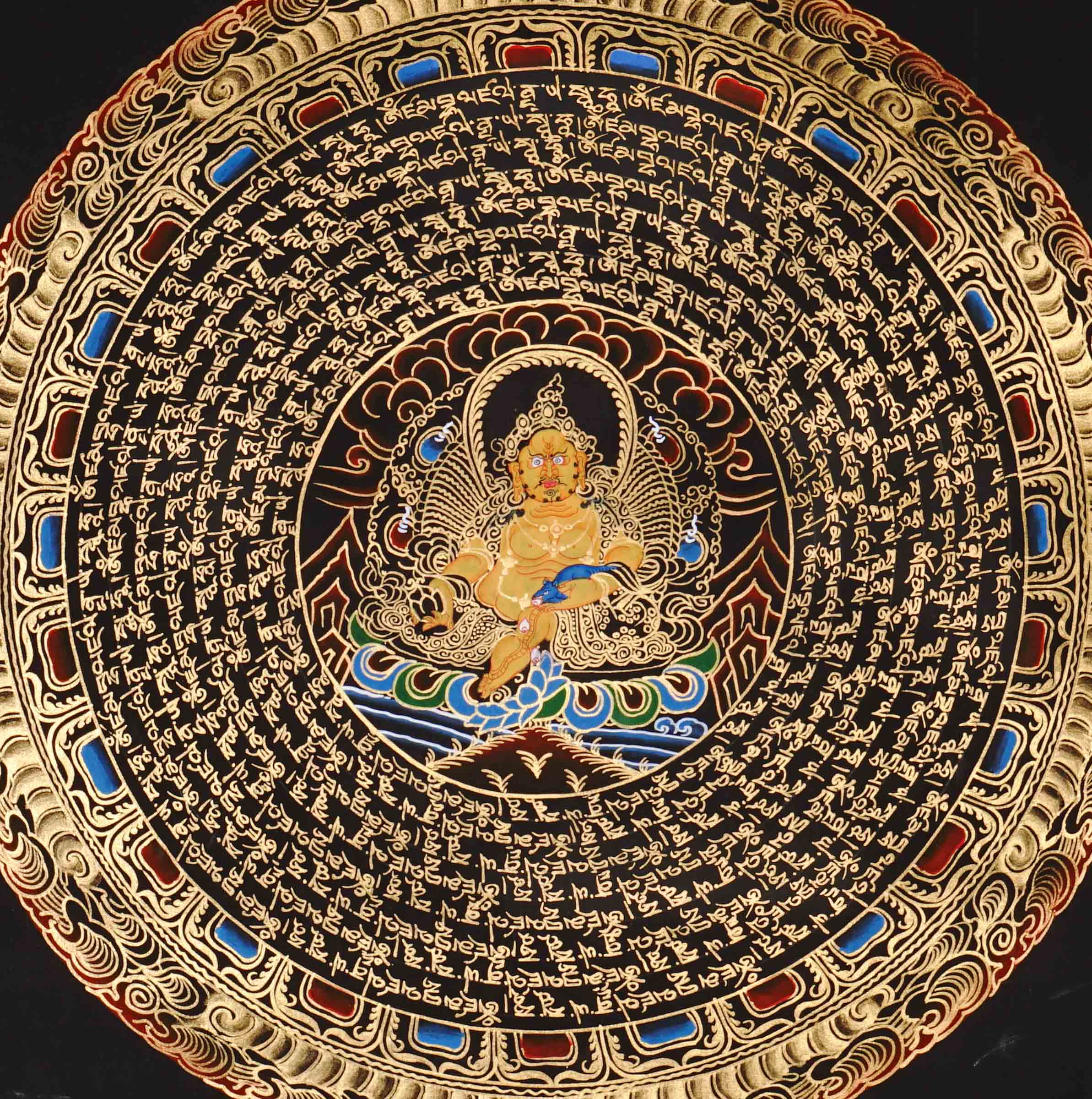 Zambhala Mandala Thangka painting with central prosperity deity, sacred Tibetan script, and traditional Himalayan Buddhist symbolism.