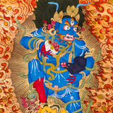 Black Zambhala thangka with wrathful wealth deity surrounded by flames