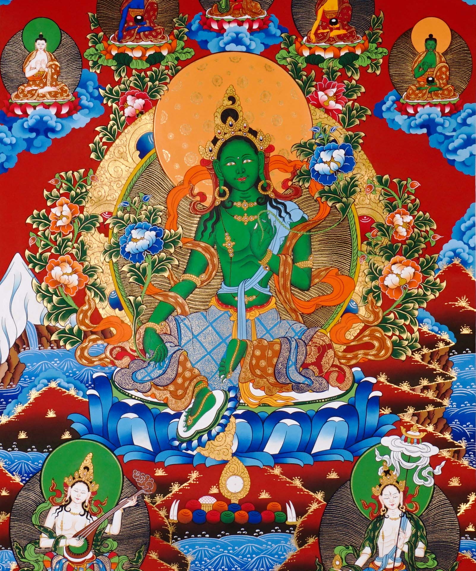 Green Tara Thangka painting with lotus throne, floral branches, celestial Buddhas, and Tibetan Buddhist compassion symbolism.