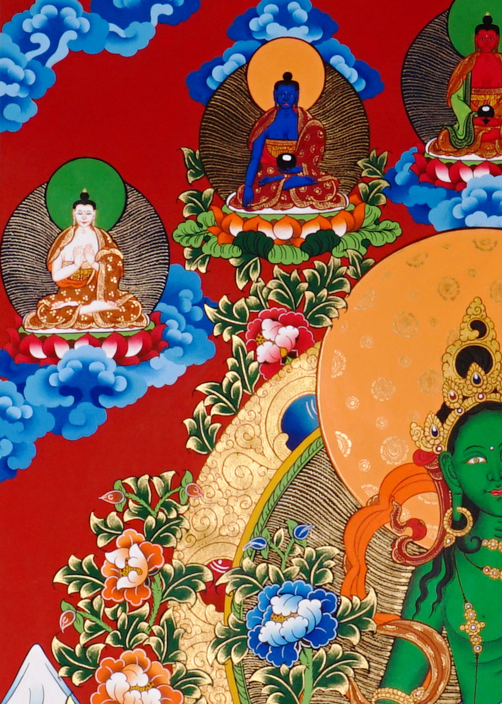 Green Tara Thangka painting with lotus throne, floral branches, celestial Buddhas, and Tibetan Buddhist compassion symbolism.